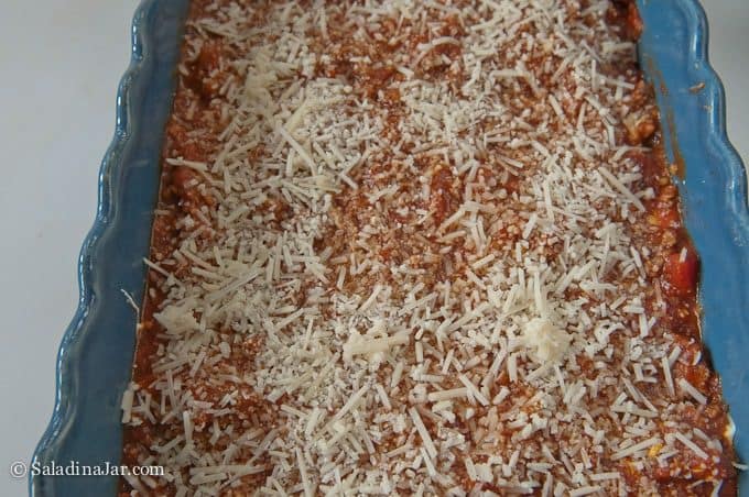 Parmesan cheese on top of sauce.