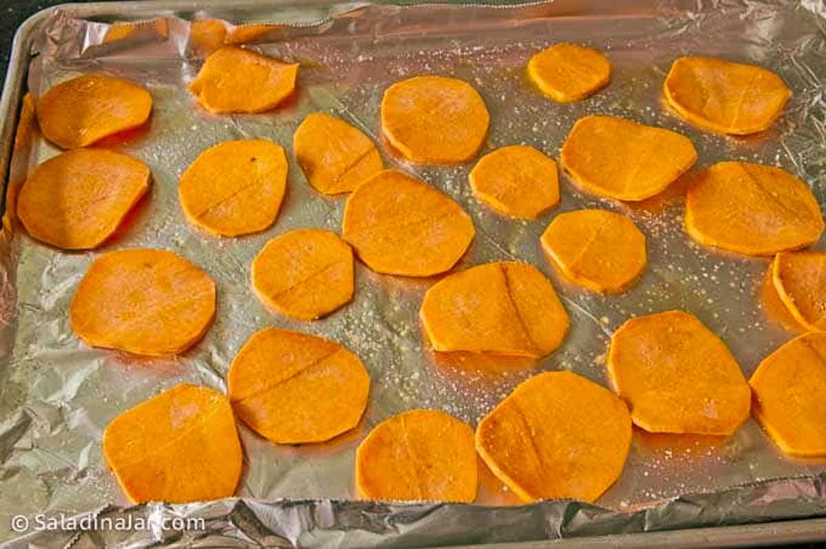 baking sweet potato chips on a baking sheet