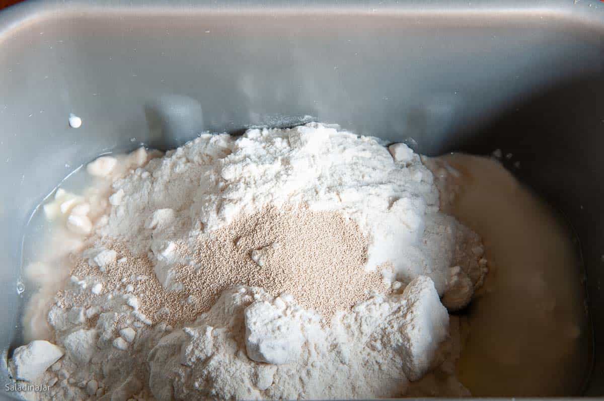 all ingredients for the dough are loaded into the bread machine pan