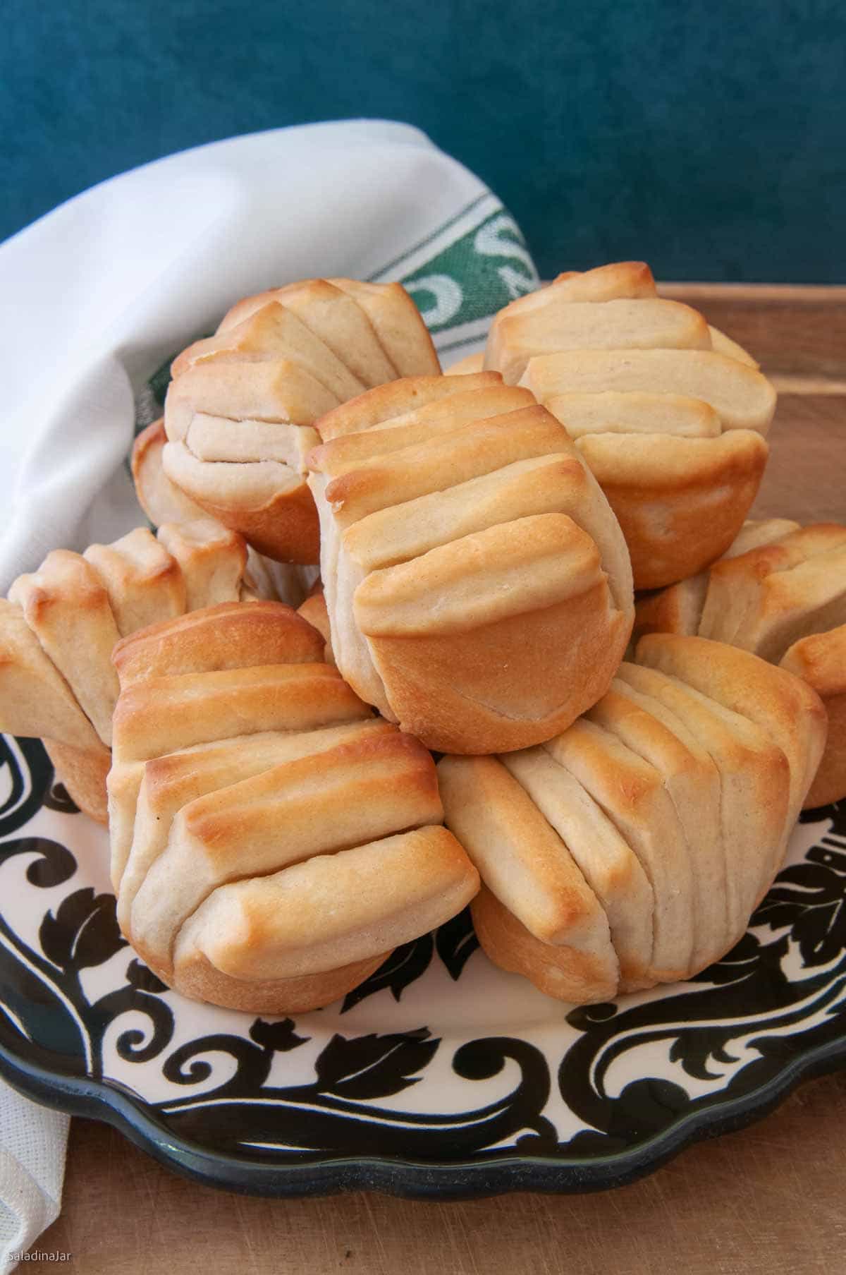 Baked yogurt bread shaped into Fantan shapes to look like brown and serve dinner rolls.