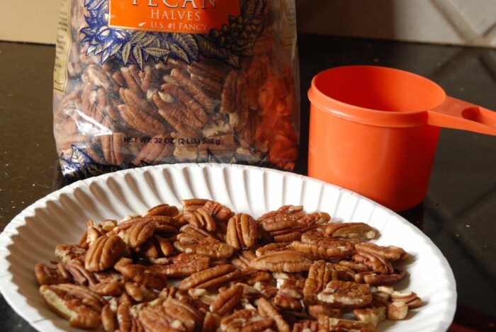 toasting pecans on a paper plate using the microwave.
