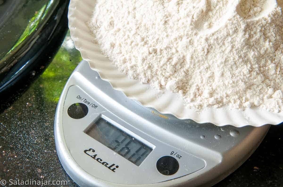 weighing flour for bread dough