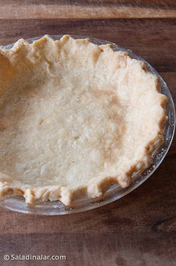 baked pie crust after using a chain inside during pre-bake.