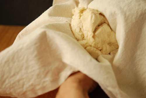 smushing the dough into a ball