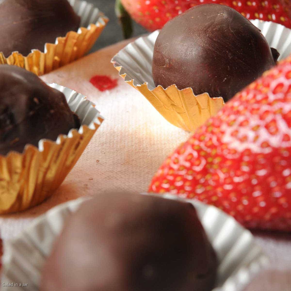 chocolate dipped chocolate chip cookie truffles with strawberries