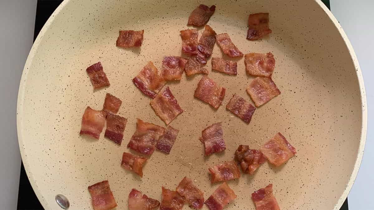 frying bacon in a skillet