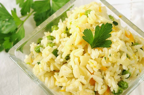 original picture of cheesy rice pilaf with peas