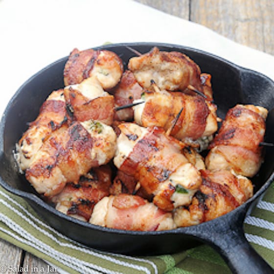 BACON-WRAPPED JALAPENO CHICKEN BITES in an iron skillet