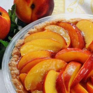 fresh nectarine pie--unsliced in a pie plate