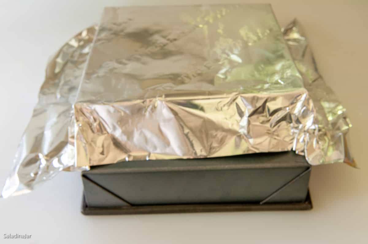 foil covering outside of upside down pan
