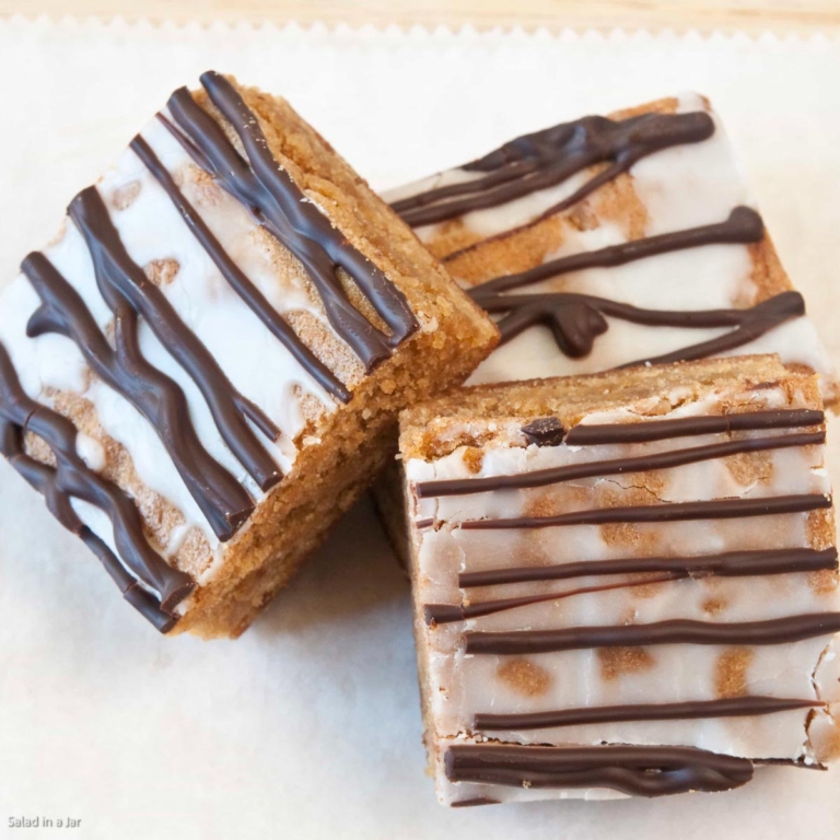 Frosted Peanut Butter Cookie Bars Drizzled with Chocolate
