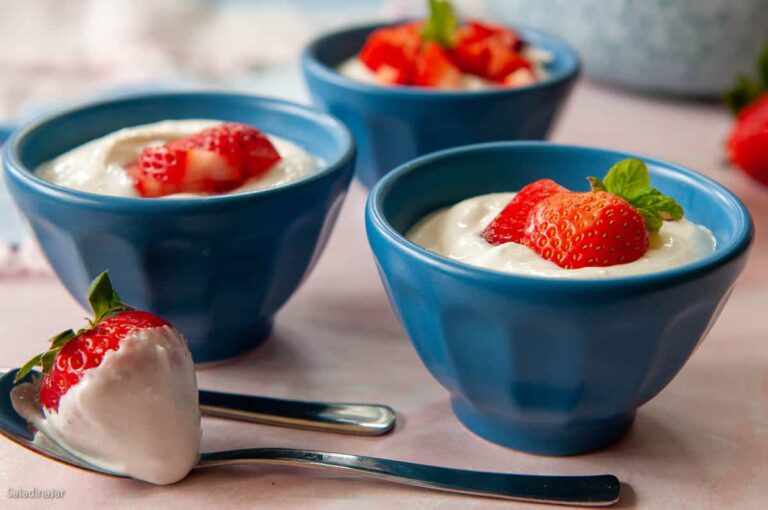 homemade yogurt with strawberries in small bowls