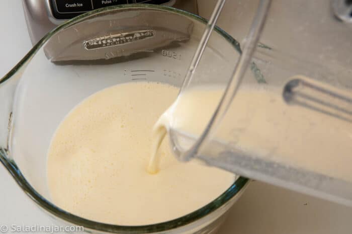 pouring uncooked custard into a microwave-safe batter bowl