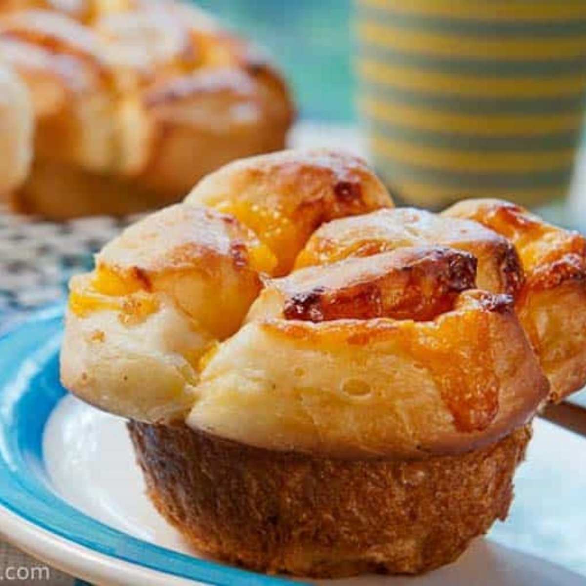 potato cheese roll sitting on a plate