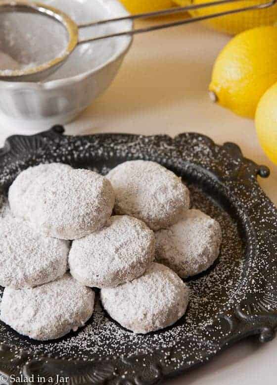 Powdered Sugar Lemon Cookies on serving plate