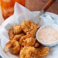 crunchy fried shrimp with remoulade sauce on the side.