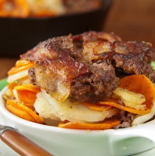 FOUR-LAYER MEAT AND POTATOES IN A SKILLET