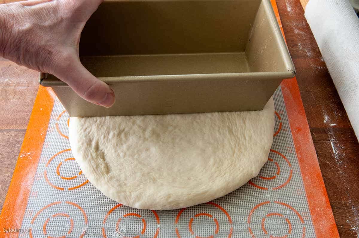 using your pan to check the size.