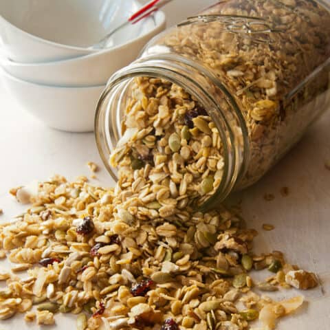 olive oil granola falling out of a Mason jar