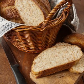 A nubbly, crunchy, and earthy-tasting white bread starring cracked whole wheat berries--a bread machine recipe to bake in your conventional oven.