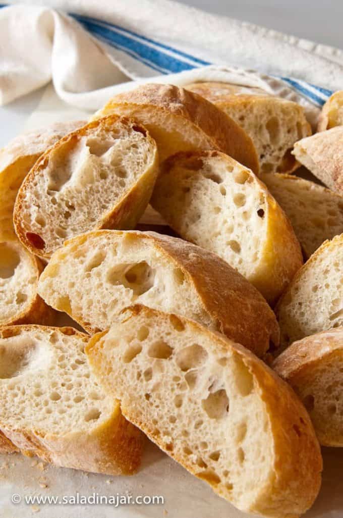 How to Make Ciabatta with a Bread Machine--sliced ciabatta on cutting board