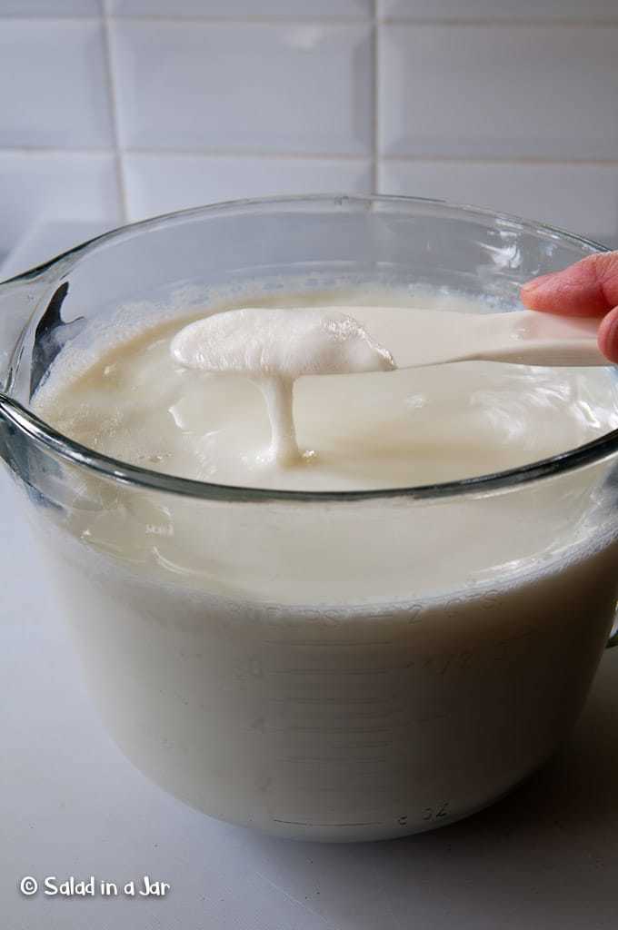  removing the skin from cooled yogurt