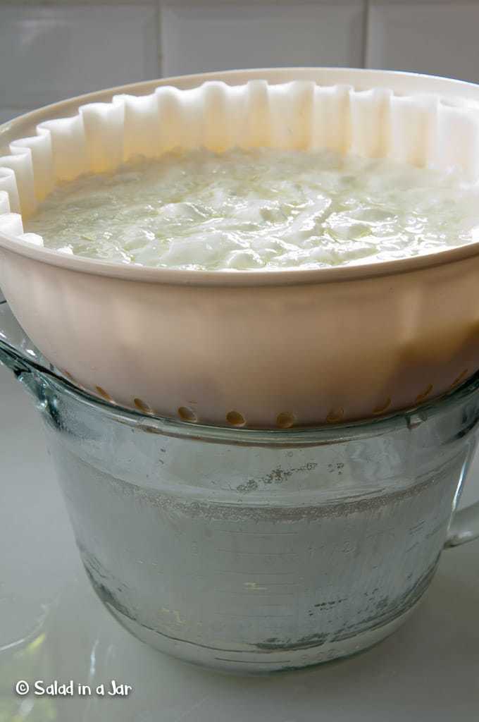 straining yogurt with a cheap colander and coffee filters