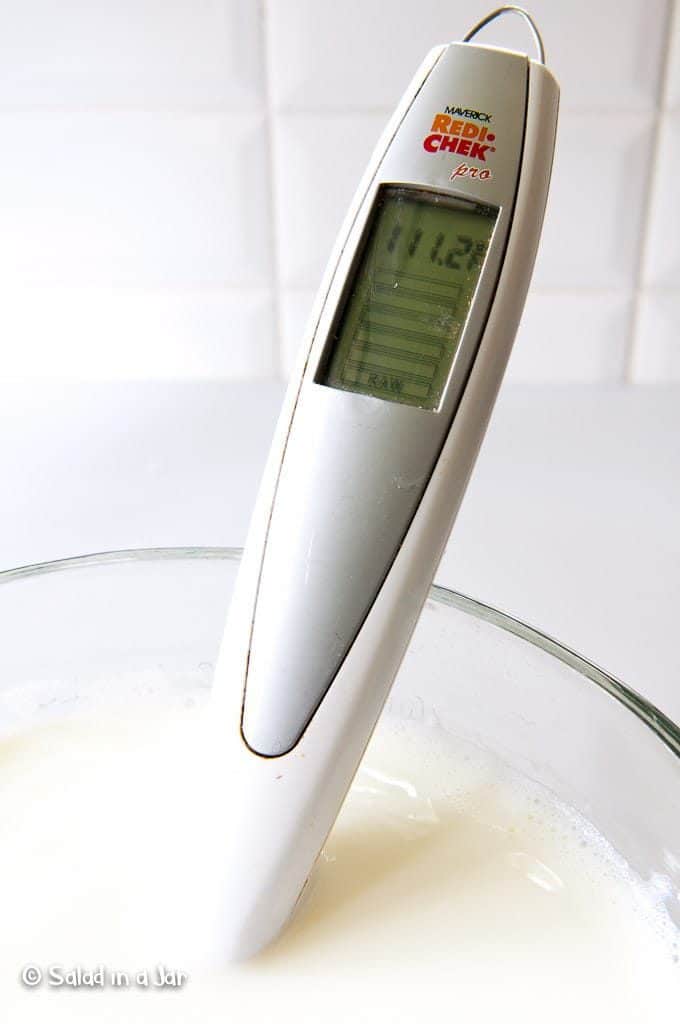 Checking temperature on cooling yogurt