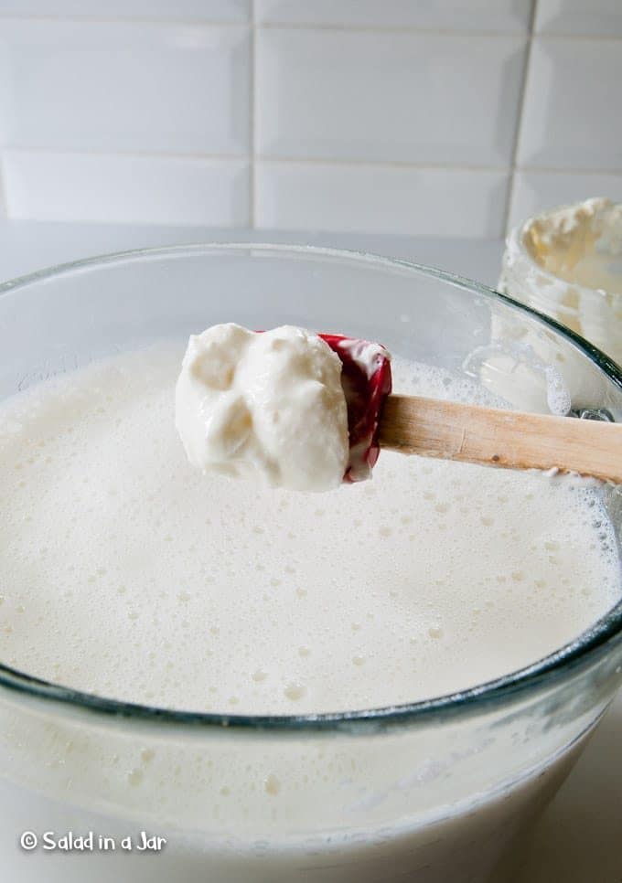 Adding starter to prepared milk.