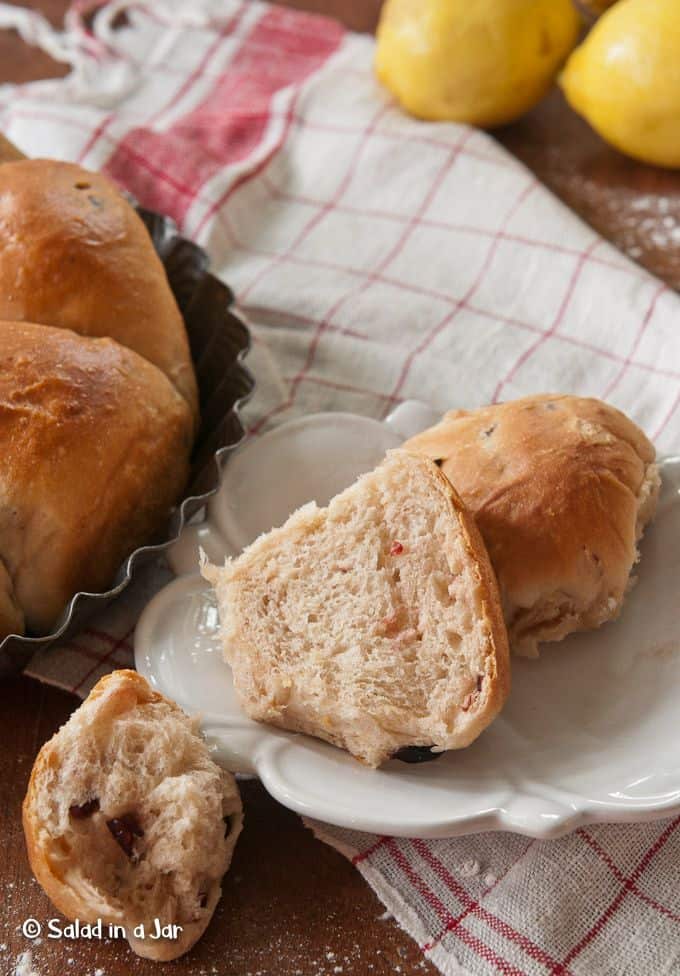 Cranberry-Lemon Dinner Rolls split on a plate