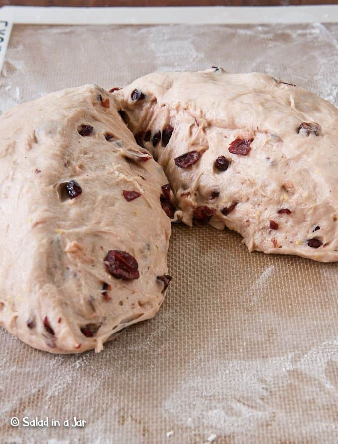 Cranberry-Lemon yeast rolls dough on floured board