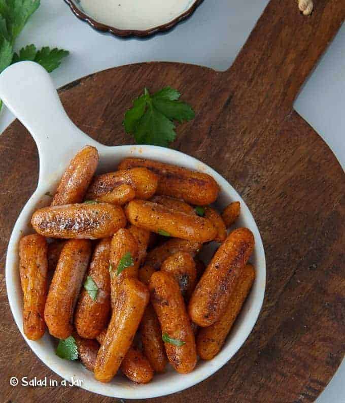 Smoked Carrots with a Secret Ingredient--Roasted baby carrots with ranch dressing on the side