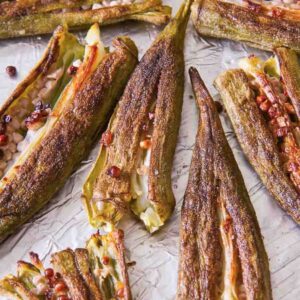 Oven-roasted okra on a baking sheet