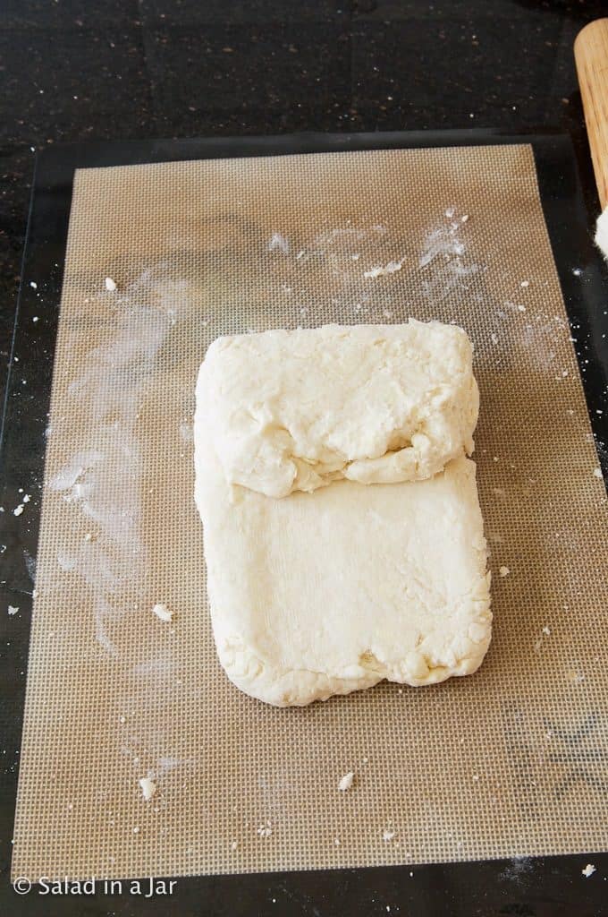 Folding 1/3 of dough over from the top.