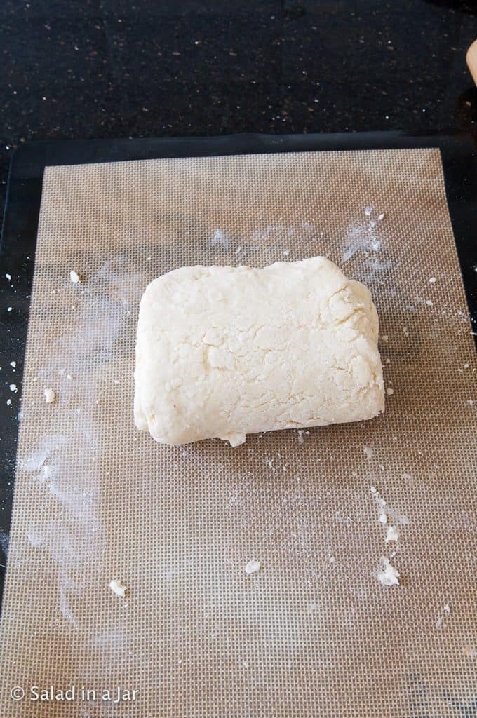 folding another third of the dough from the bottom.