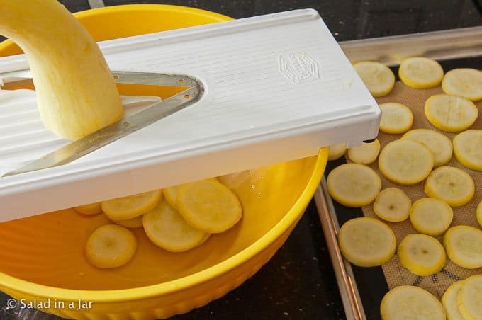 slicing vegetables with mandolin