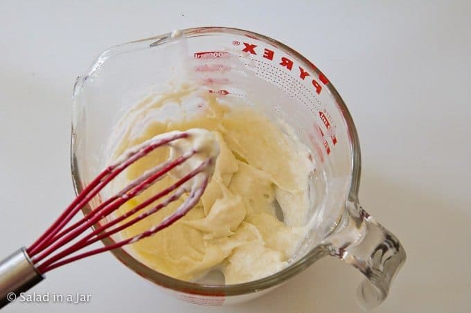 whisking the flour and milk mixture after cooking in the microwave