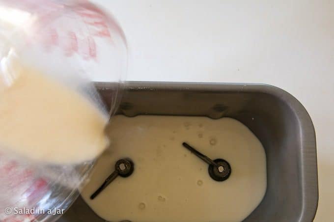 adding the cooked milk and flour mixture
