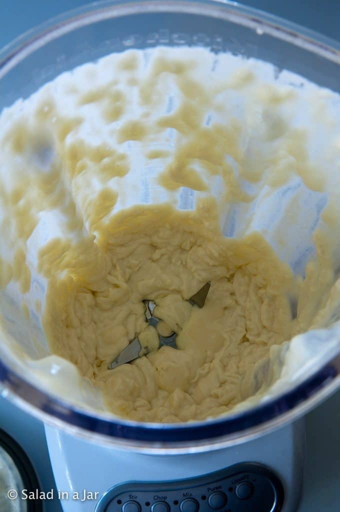 mixing oil into mayo in blender