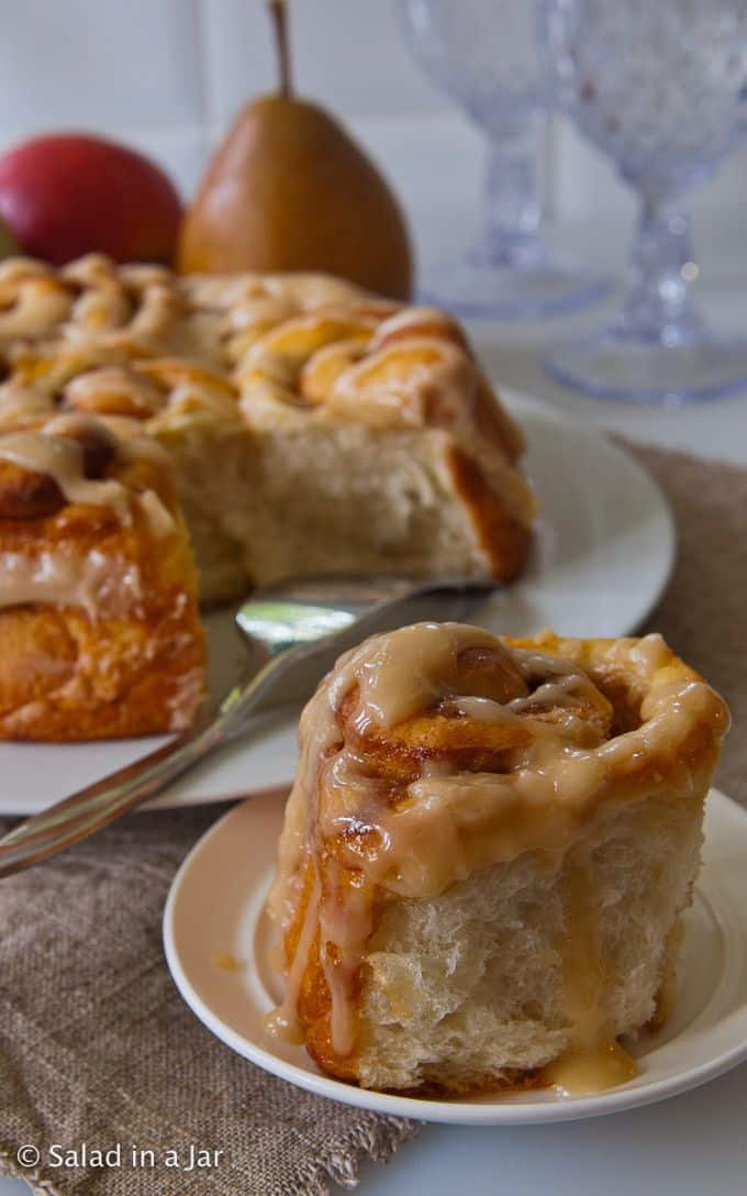 Tangzhong Cinnamon Rolls  with a single roll pulled out.