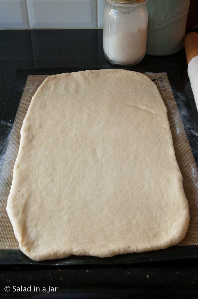 Rolling out dough to begin making Tangzhong dinner rolls.