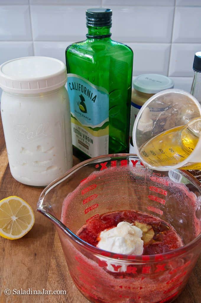 Adding remaining ingredients for Strawberry Dressing