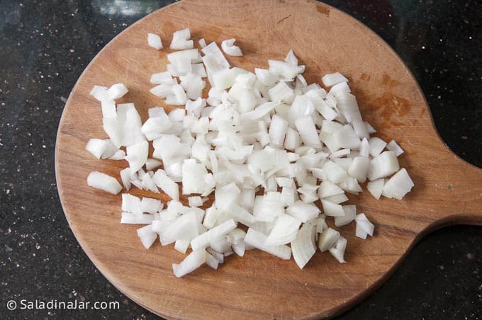 Chop onions and add to the bacon grease.