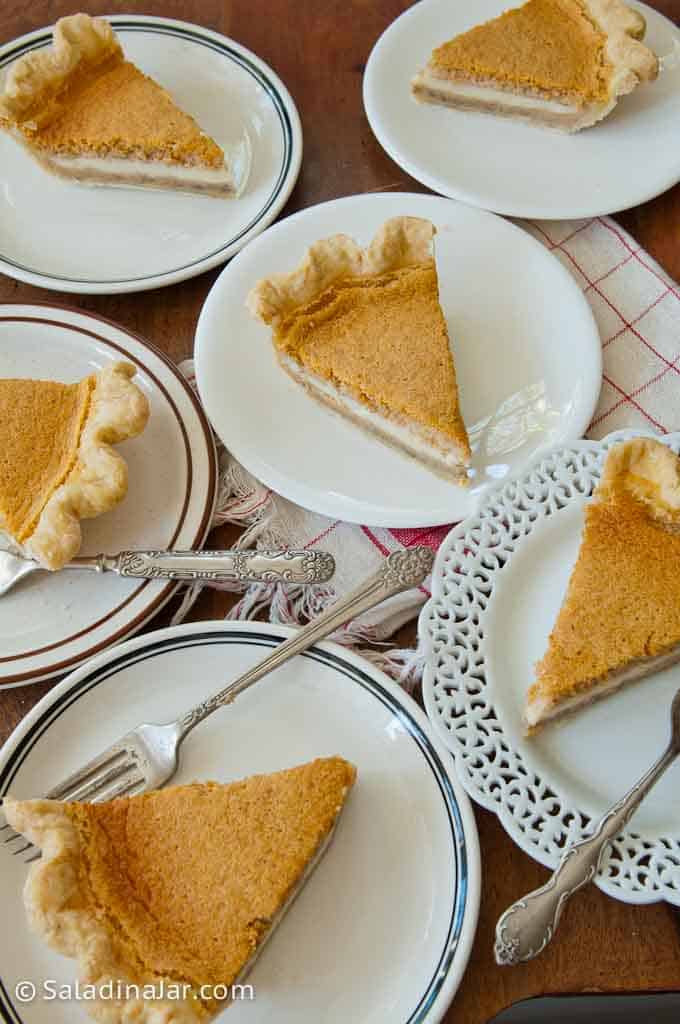 Slices of layered pumpkin custard pie