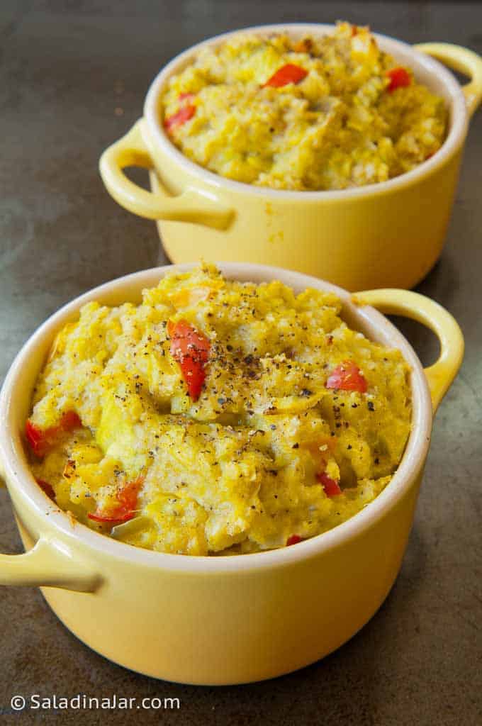 Yellow Squash Souffle in two mini casserole dishes.