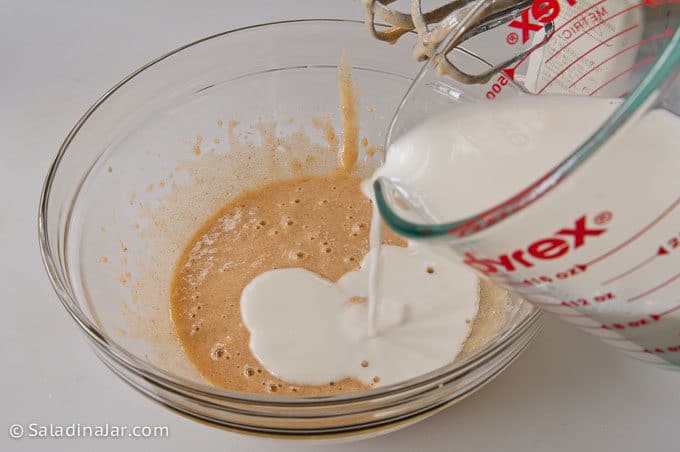 adding milk to pumpkin mixture