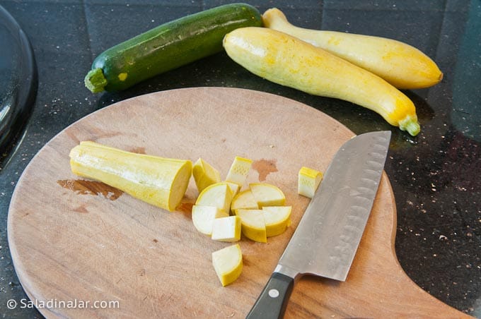 Cutting up yellow squash