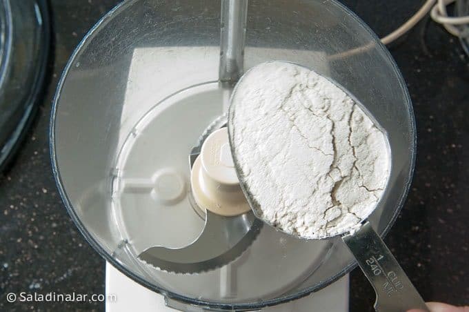 mixing dumpling dough in a food processor