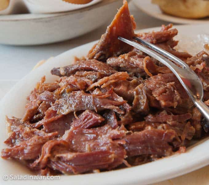 Slow cooker ham on a serving plate