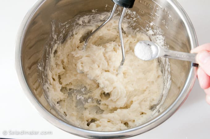 adding salt for mashed potato layer